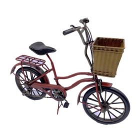Bicicleta em metal vermelha, com cesto